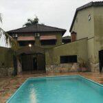 Uma das casa de apoio do PCC em Campo Grande tinha até piscineiro (Foto: Divulgação)