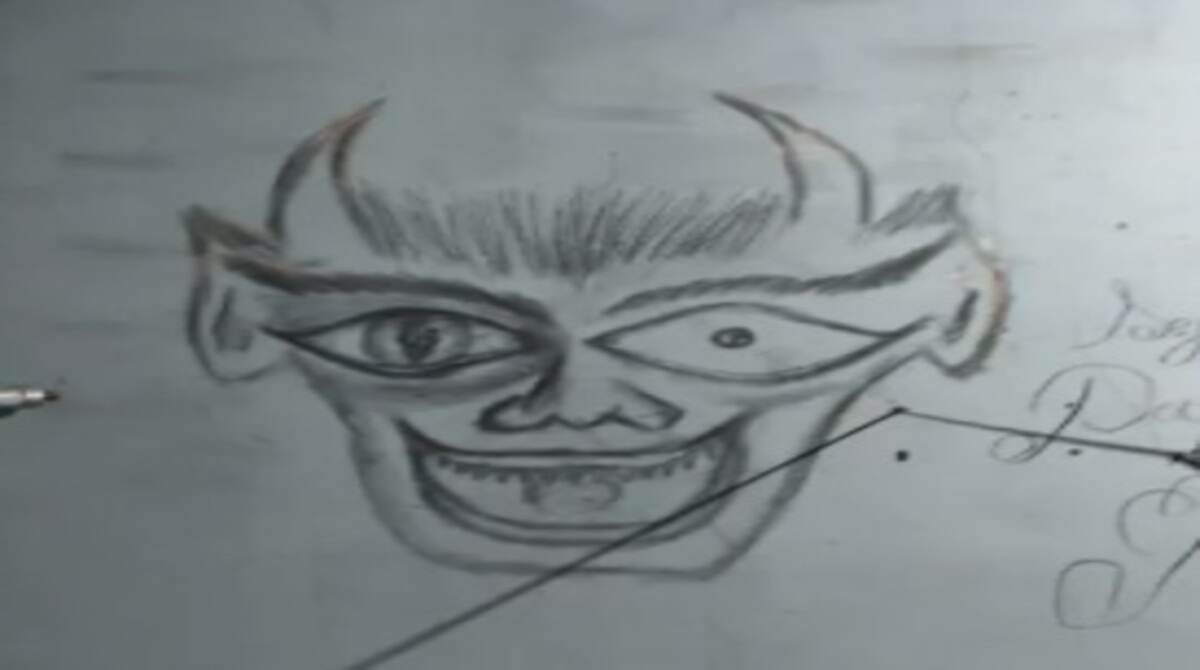 Desenho que remete ao demônio estava na parede do local do crime
