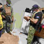 Momento em que pistoleiro foi peso por agentes da Senad