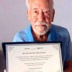 Andrelino com sua placa