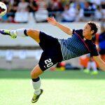 [Abby Wambach jogando pela seleção estadunidense