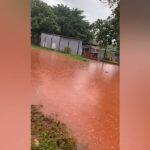 Rua alagada depois da chva