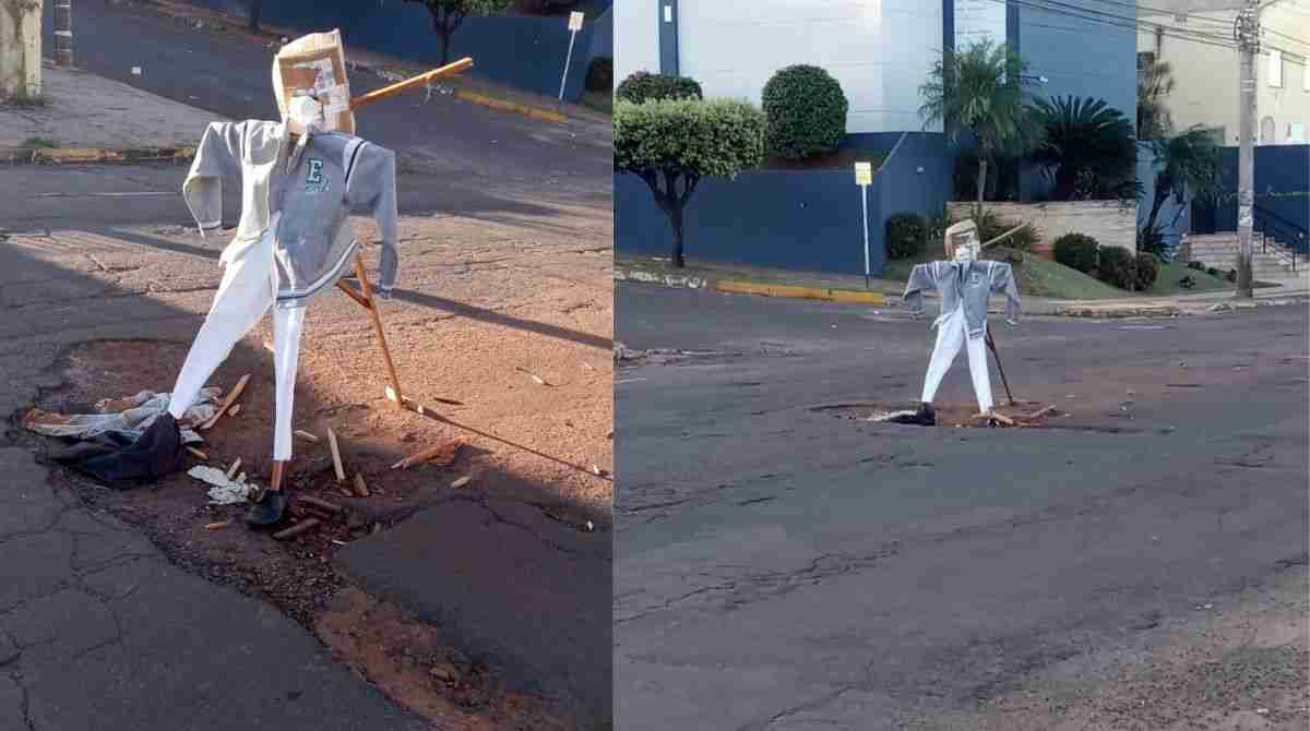 Boneco sinaliza buraco em Campo Grande