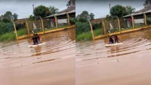 Virou moda? Remando, crianças brincam de barco após alagamento no Jardim Paris
